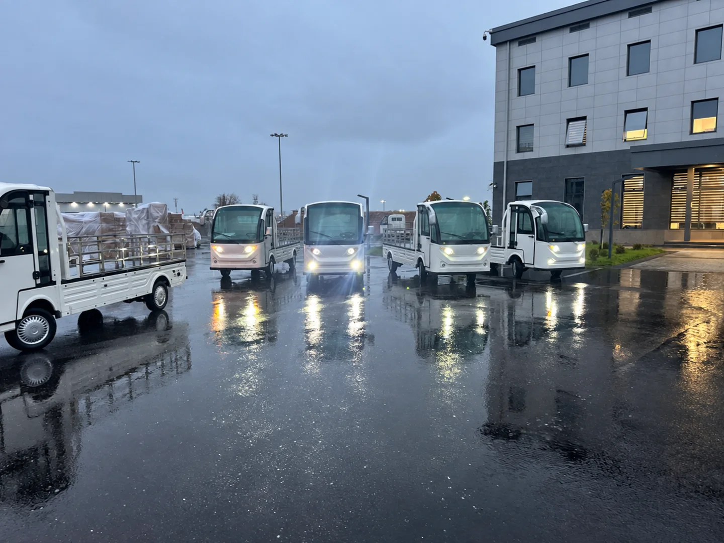 Electric utility vehicles in a wet outdoor yard
